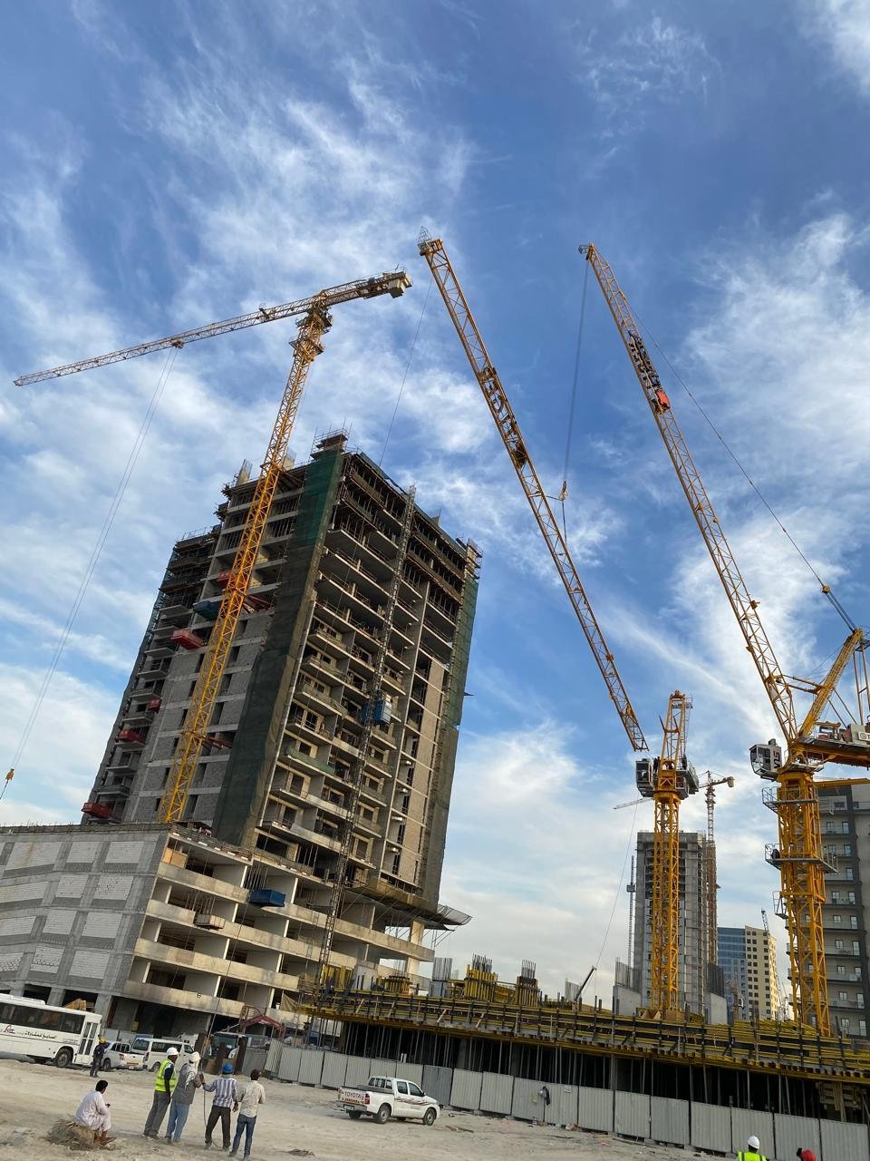 High-rise construction project reflecting quality-focused crane operations and planning.
