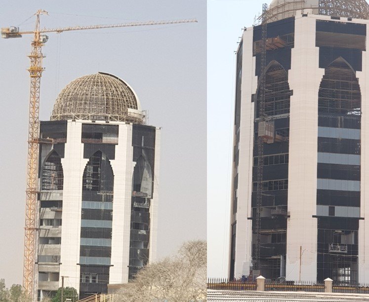Close technical field photo showing detailed crane maintenance work.