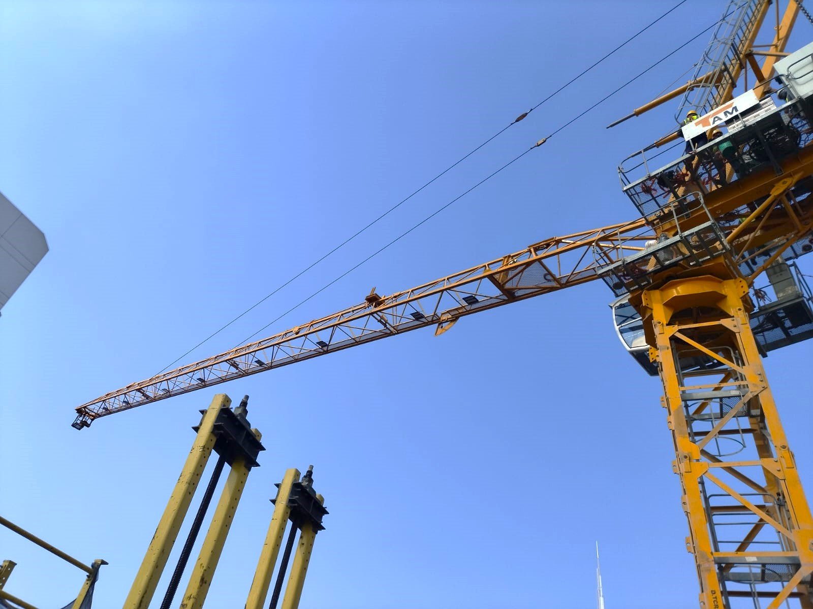 Large active project site showing tower crane work carried out by the TAM team.